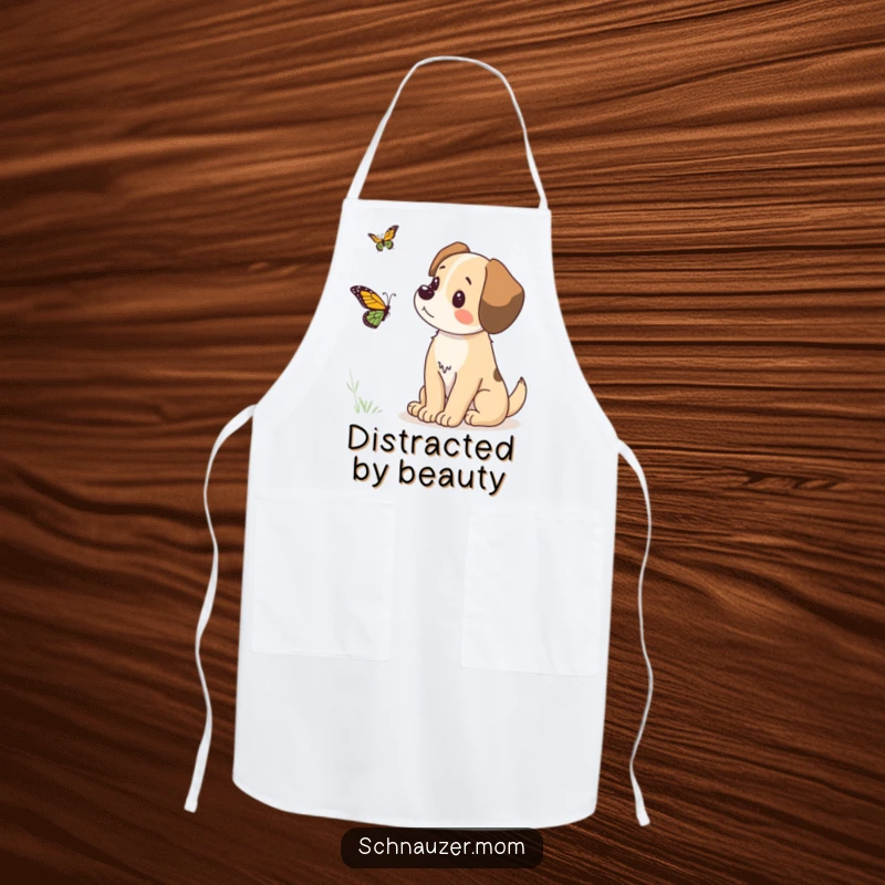 Funny apron illustrating a dog's amusingly alert posture while observing a butterfly, a humorous and practical item for culinary enthusiasts.