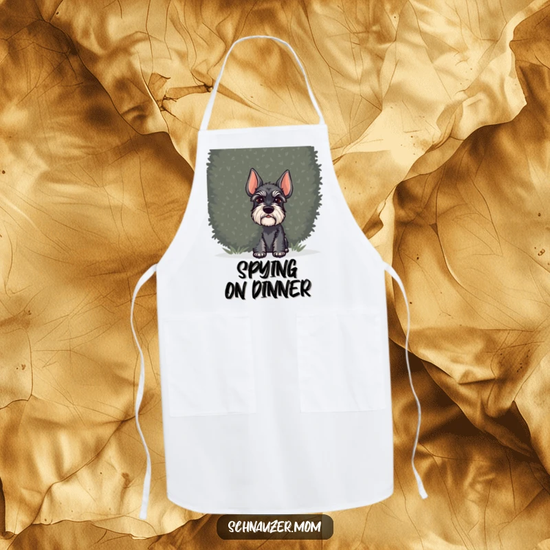 Funny Schnauzer dog apron, illustrating a dog peeking from behind a shrub, perfect for kitchen duties with a touch of playful espionage.