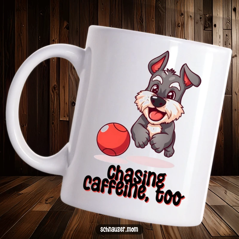 Funny Schnauzer mug of a playful dog with a determined grin chasing a bouncing red ball with enthusiastic focus.