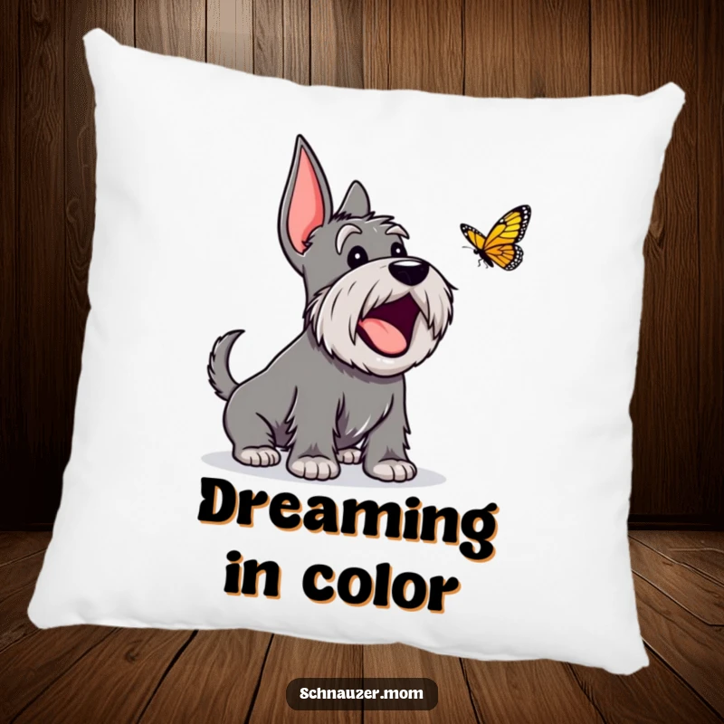 Funny Schnauzer pillow featuring an excited dog character barking happily at a butterfly, adding a touch of canine exuberance.