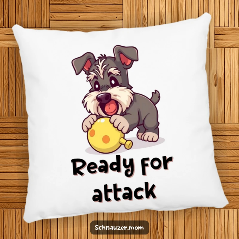 Funny Schnauzer lady pillow showing a dog playfully pouncing on a squeaky toy, offering comfort and a touch of humorous, energetic decor.