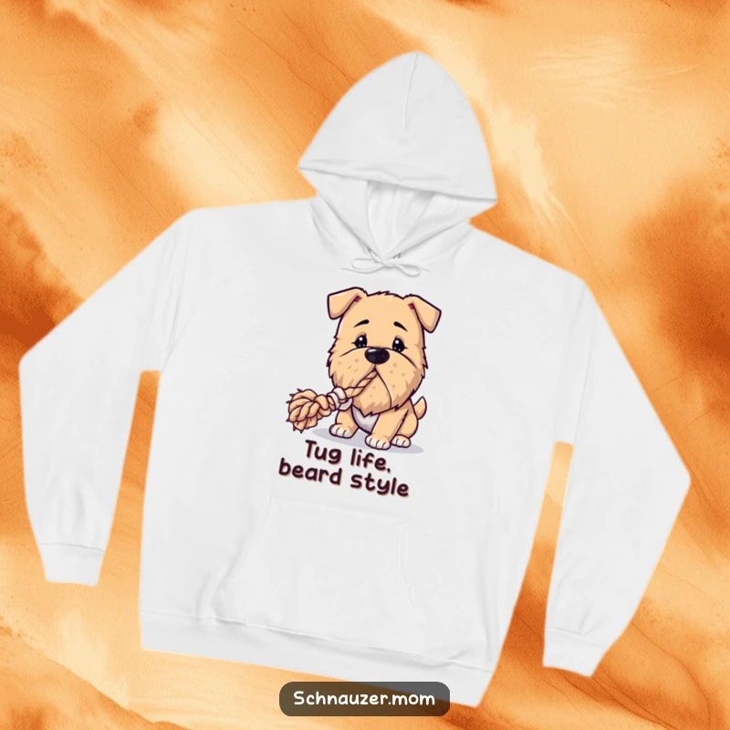 Funny Bearded Dog Hoodie: A dog with a thick, distinguished beard is actively pulling on a rope toy, showing its playful nature.