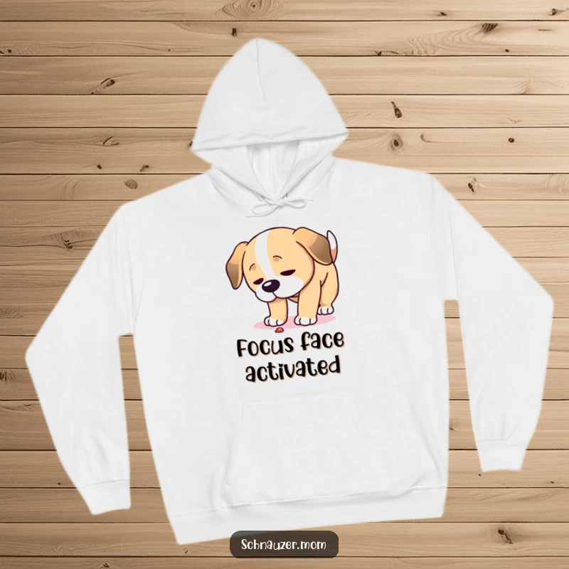Funny Focused Dog Hoodie: A dog has its head down, intently studying something on the ground, embodying focused curiosity.