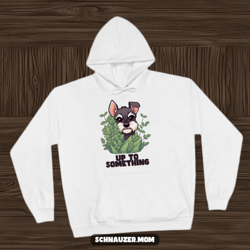 Funny Schnauzer hoodie featuring a dog peeking out from behind a plant, with a mischievous glint suggesting playful secrets.