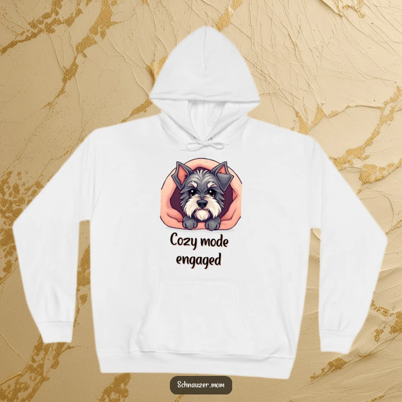 Funny Kawaii Schnauzer hoodie showing a cute dog peeking from under a cozy blanket, offering warmth and adorable charm.