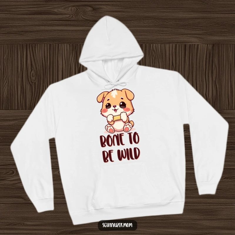 Funny Hoodie: Cozy apparel featuring a character holding a small bone with pure glee, radiating happiness and treat-loving vibes, an excellent funny gift.