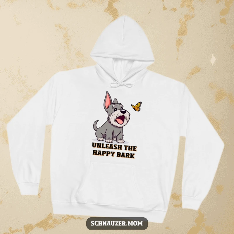 Funny Schnauzer hoodie featuring an excited dog character barking gleefully at a butterfly, embodying pure canine happiness.