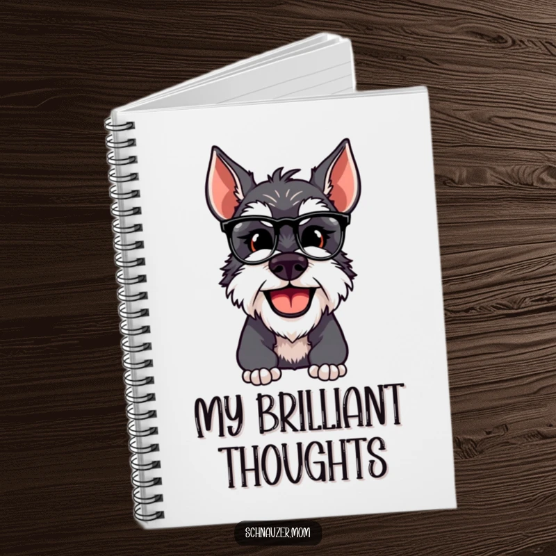 Funny Schnauzer dog with spectacles, smiling on the cover of a notebook, ready for writing.