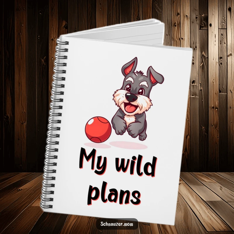 Funny Schnauzer notebook showcasing a playful dog with a determined grin chasing a bouncing red ball, perfect for focused writing.