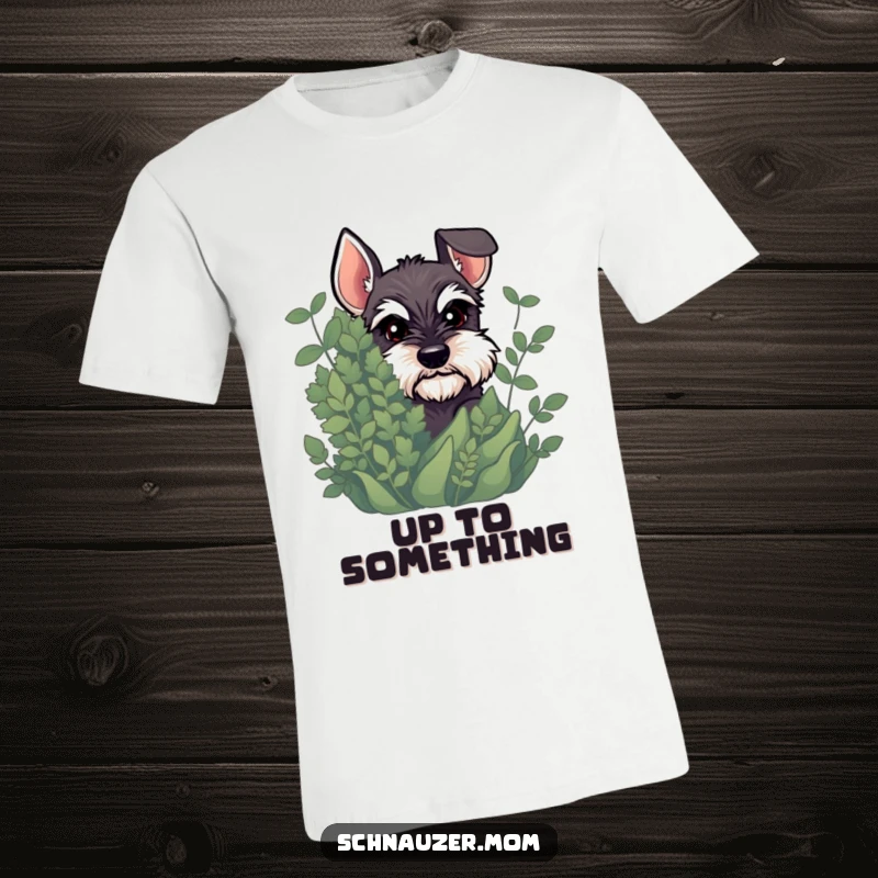 Funny Schnauzer t-shirt depicting a dog peeking slyly from behind dense foliage with a knowing, mischievous expression.
