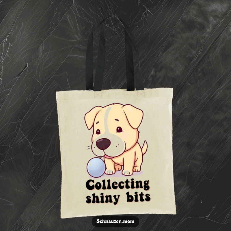 Funny tote bag featuring a curious dog nudging a shiny object, symbolizing exploration and intrigue for everyday use.