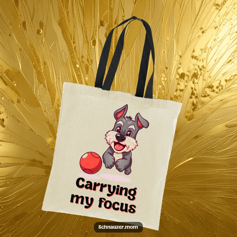 Funny Schnauzer tote bag showing a playful dog with a determined grin chasing a bouncing red ball with enthusiastic focus.